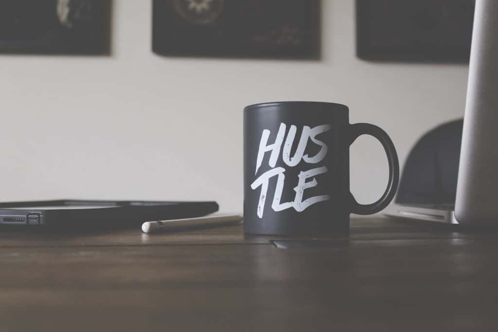 How to prepare for a recession
mug on desk with hustle written on it